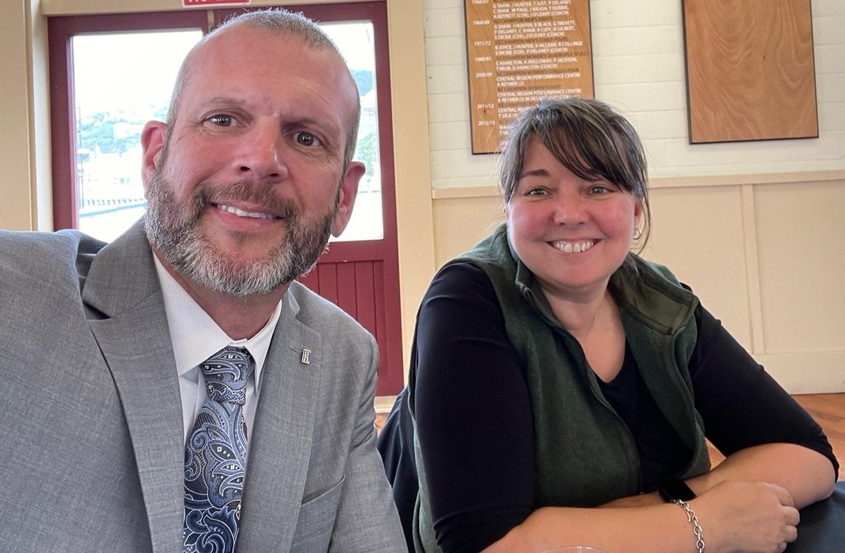 Paul Belair, BCRSP Board Chair wearing a grey suit, white shirt, with tie and Nikki Wright, BCRSP Executive Director, wearing a black blouse.